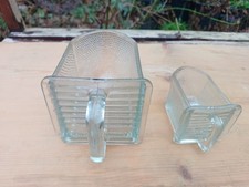 old smaller glass pouring